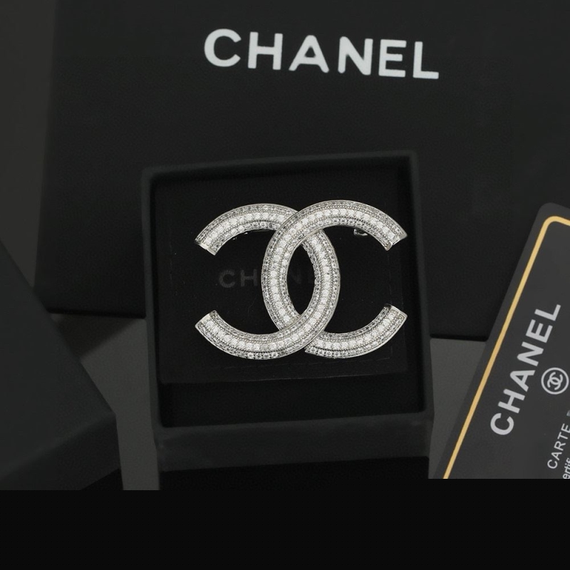 Ch*el brooches